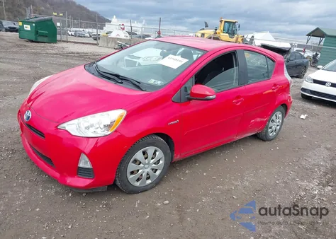 2012 Toyota Prius C from USA, damaged, VIN JTDKDTB33C1527017